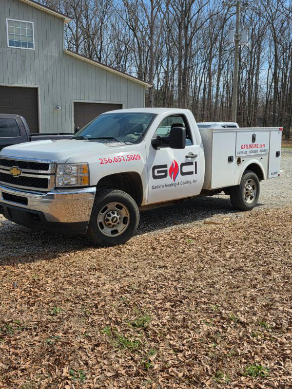 HVAC technicians from Gatlin's Heating & Cooling servicing North Alabama homes